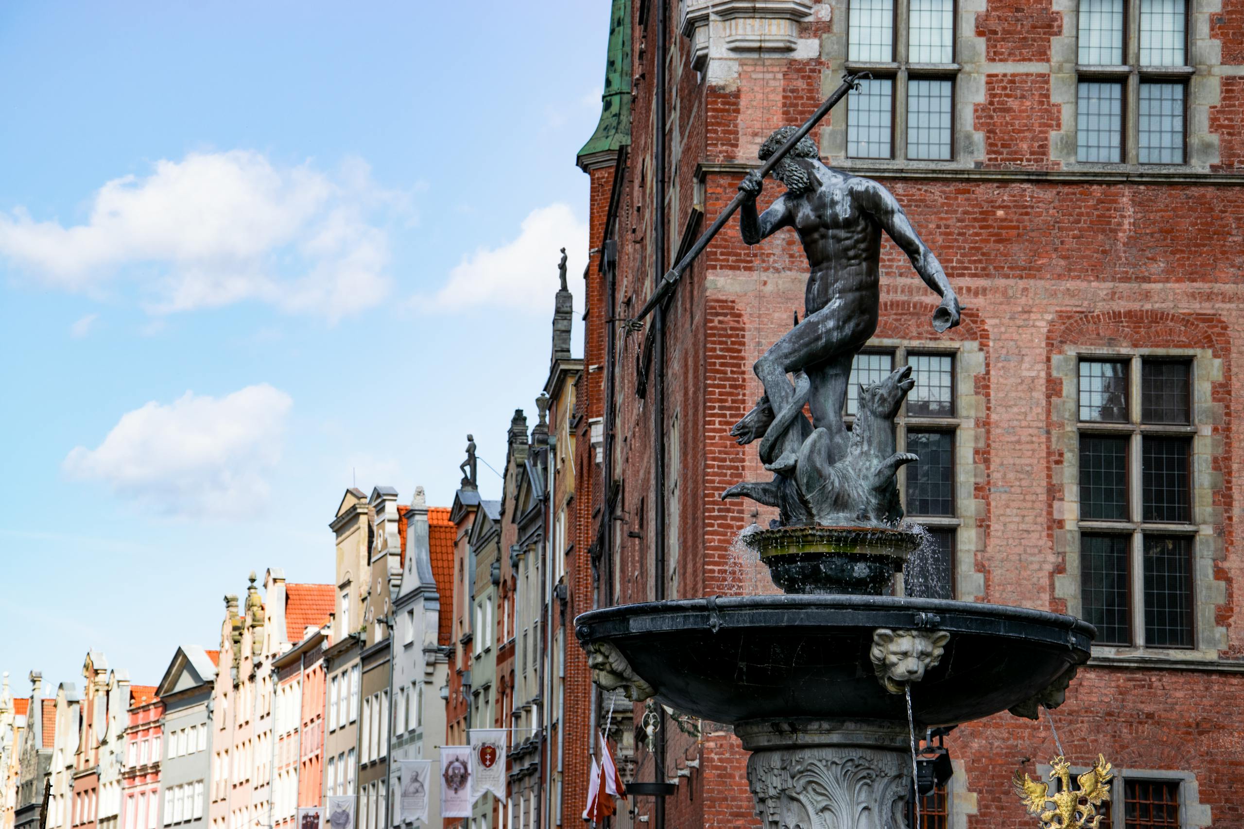 Discover the historic Neptune's Fountain, a famous Gdansk landmark on Long Market, Poland.